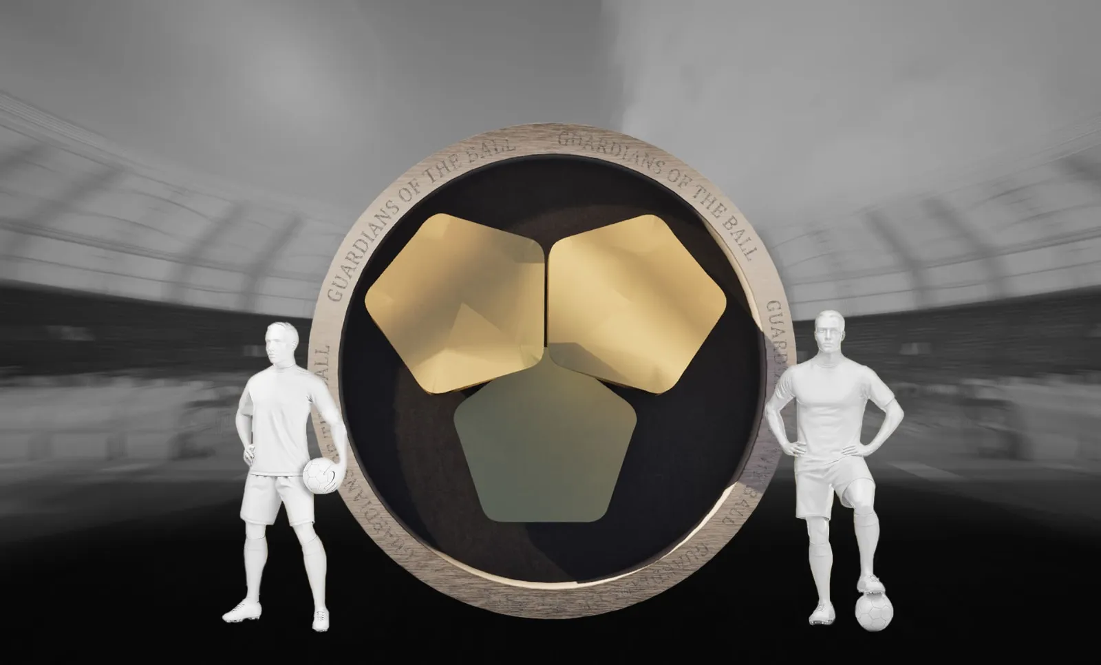 Two football player statues stand alongside the Guardians Of The Ball logo